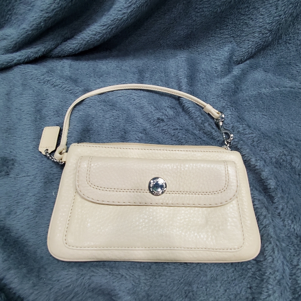 Coach wristlet - cream / tan color